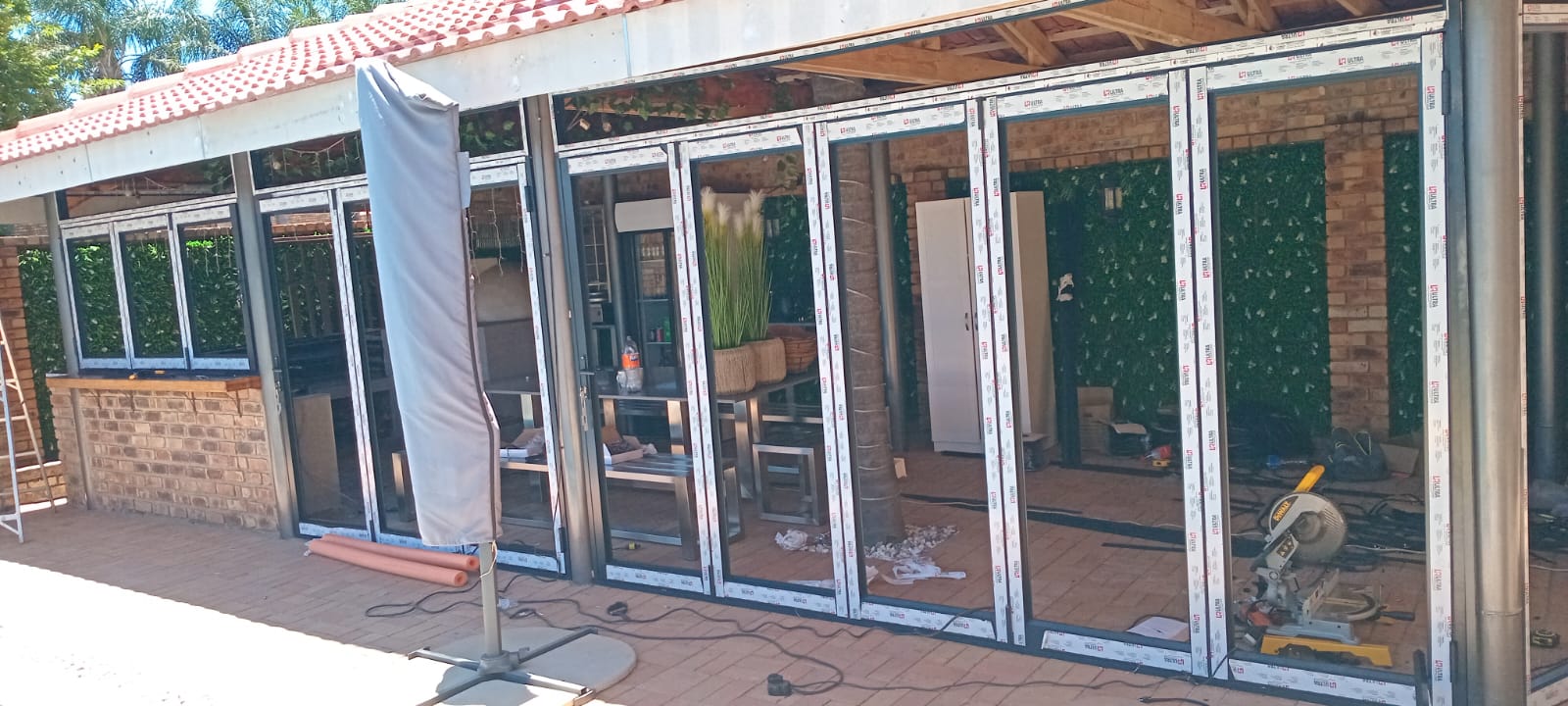 Large folding door installation in patio area