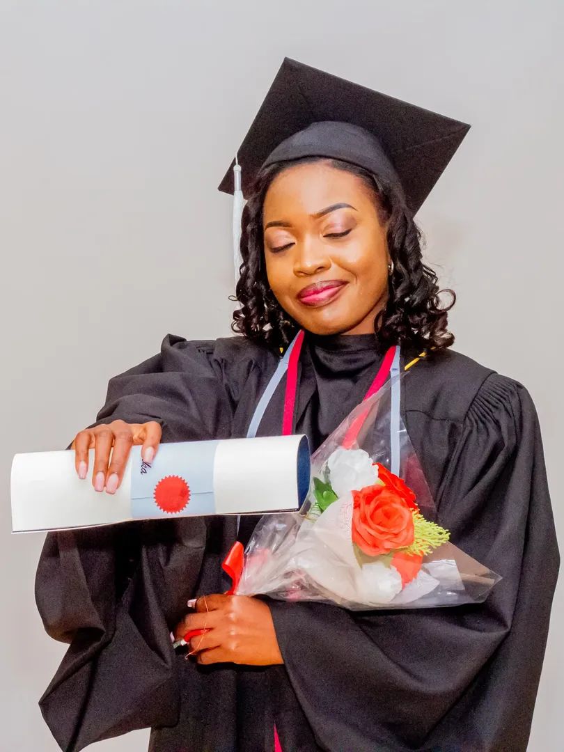 Graduate with flowers