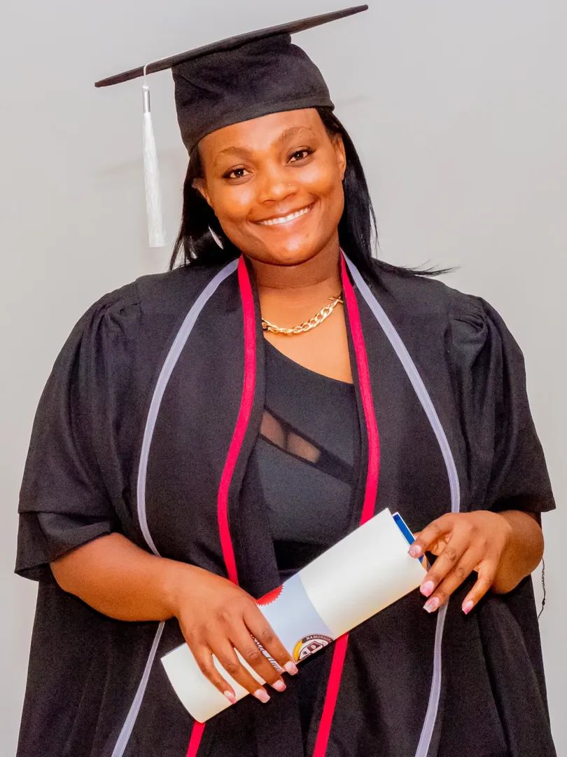 Female graduate with diploma