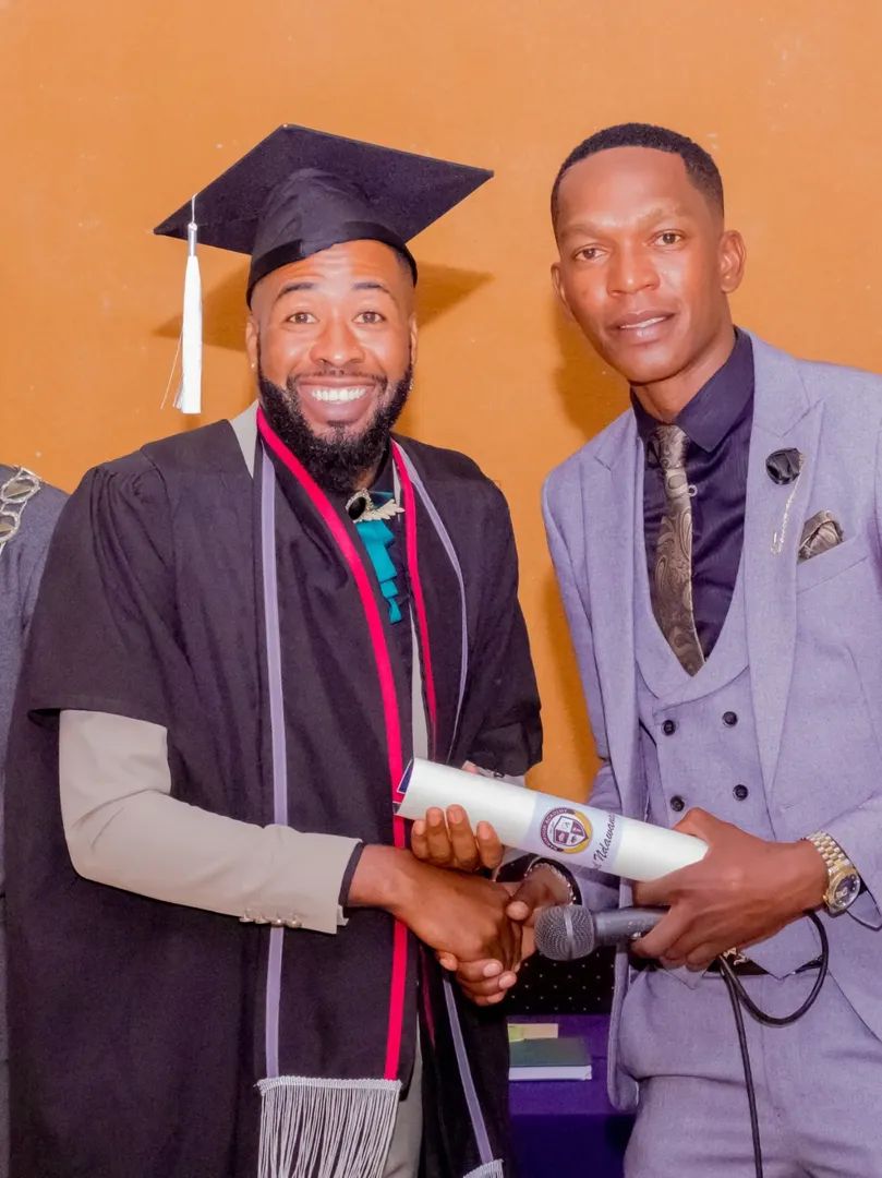 Graduate receiving diploma
