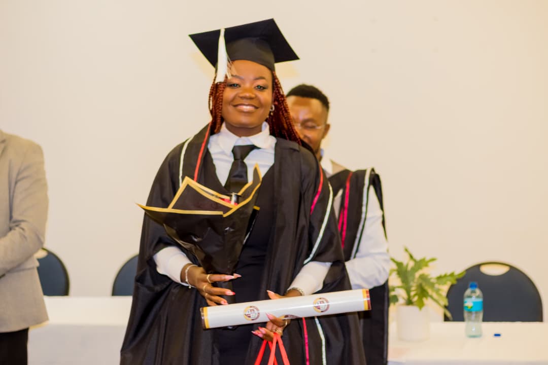 Graduate with bouquet
