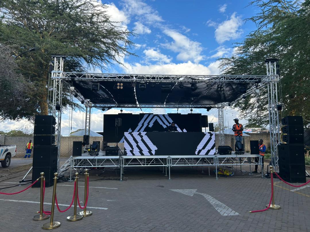 Outdoor stage with large LED screen display and professional metal truss structure