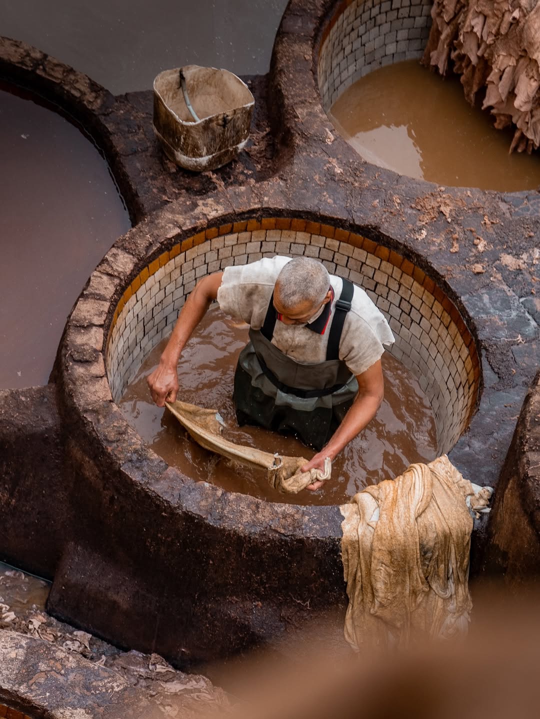 Traditional Fes tannery worker