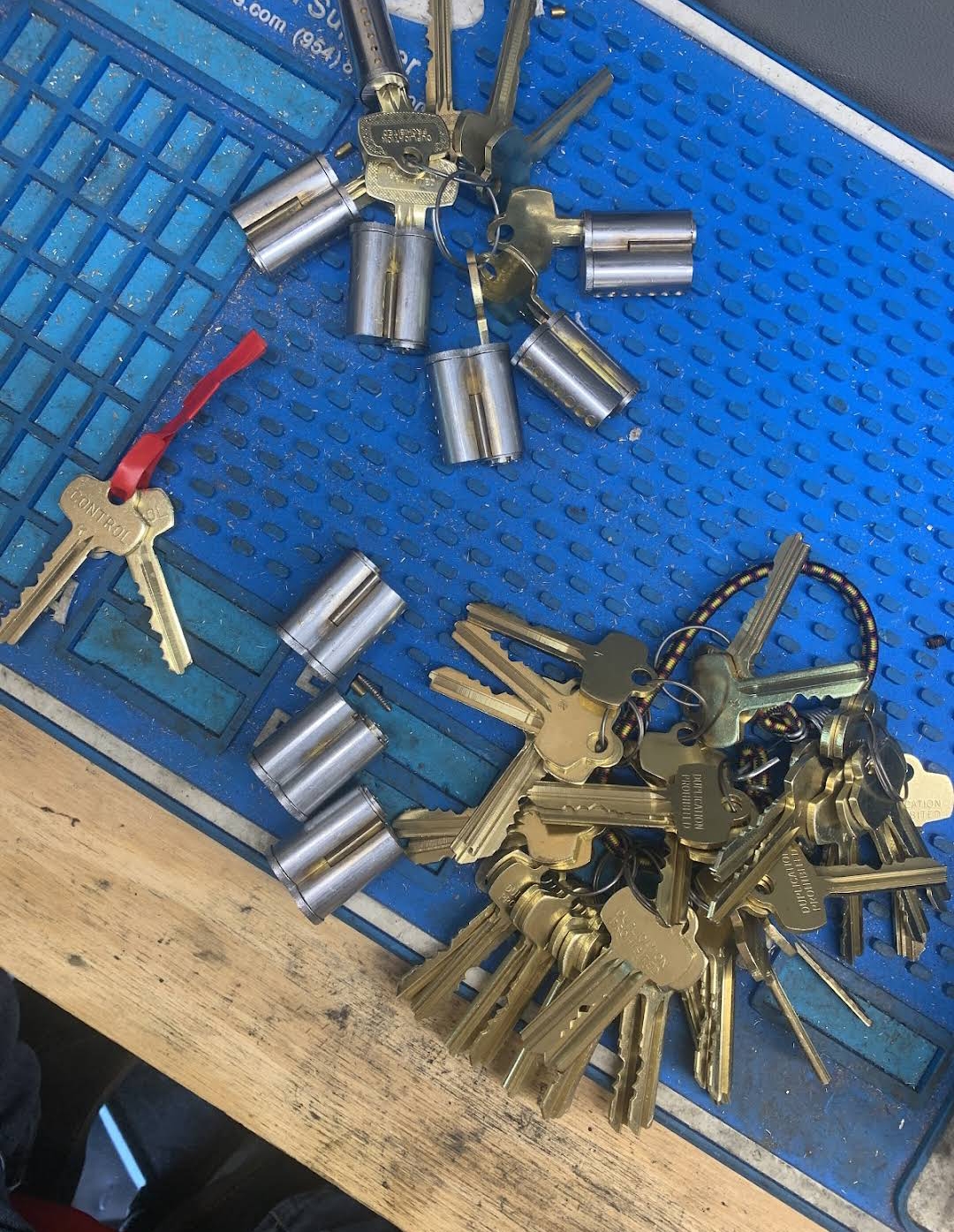 Master key system cylinders and control keys on work mat