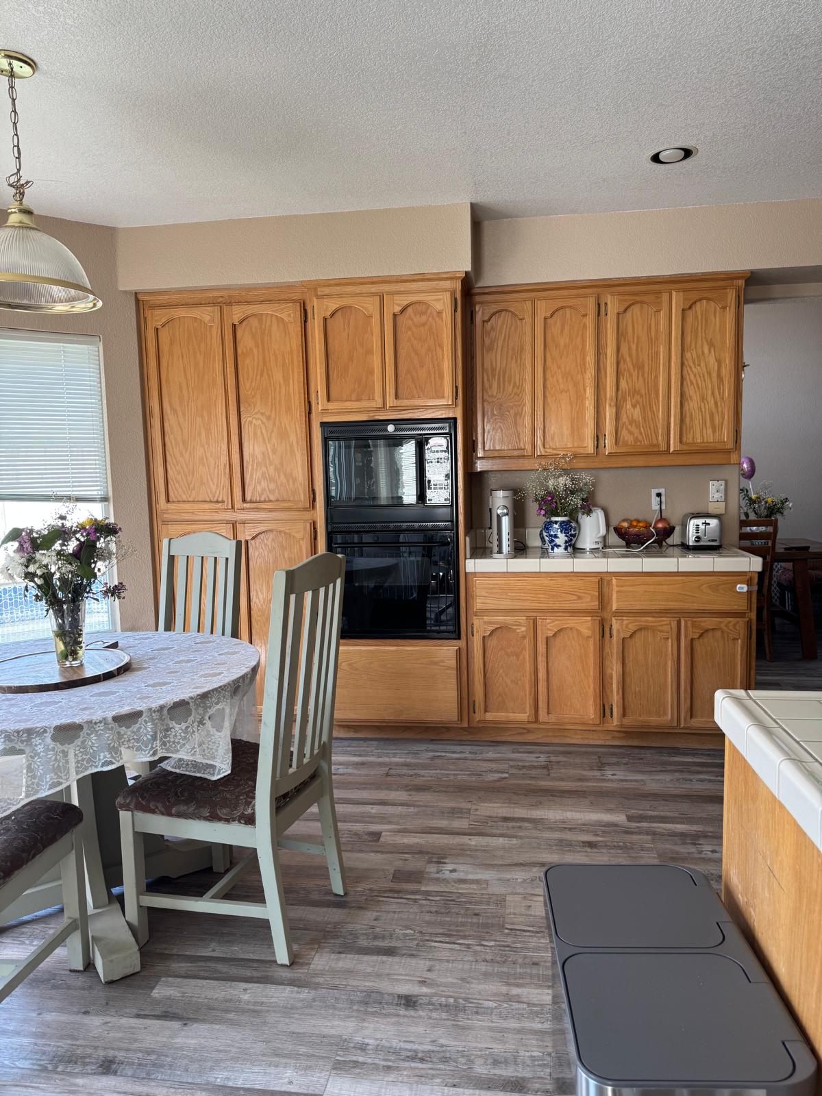 Warm kitchen and dining space where children share meals
