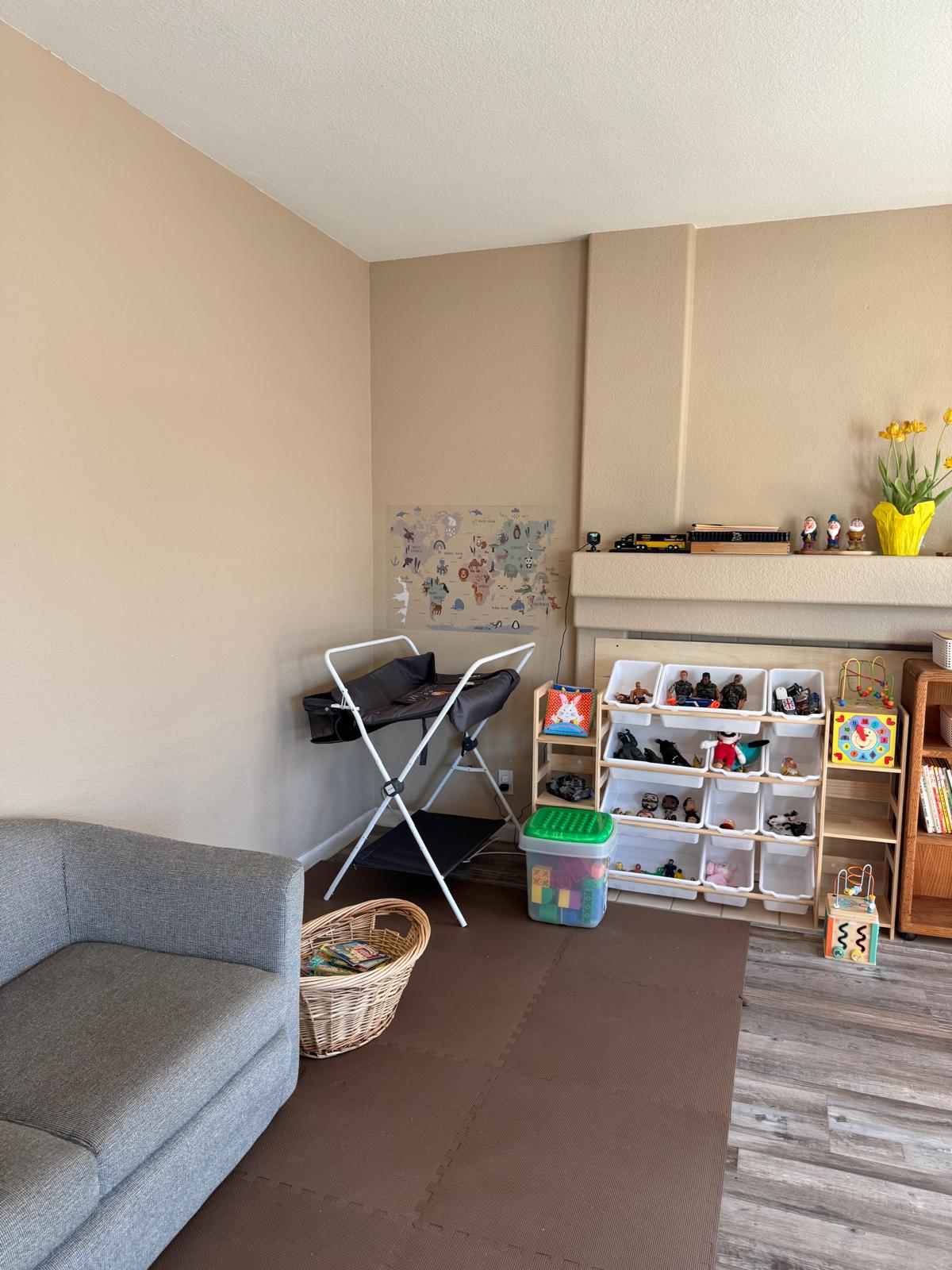 Reading corner with a sofa and a basket of books