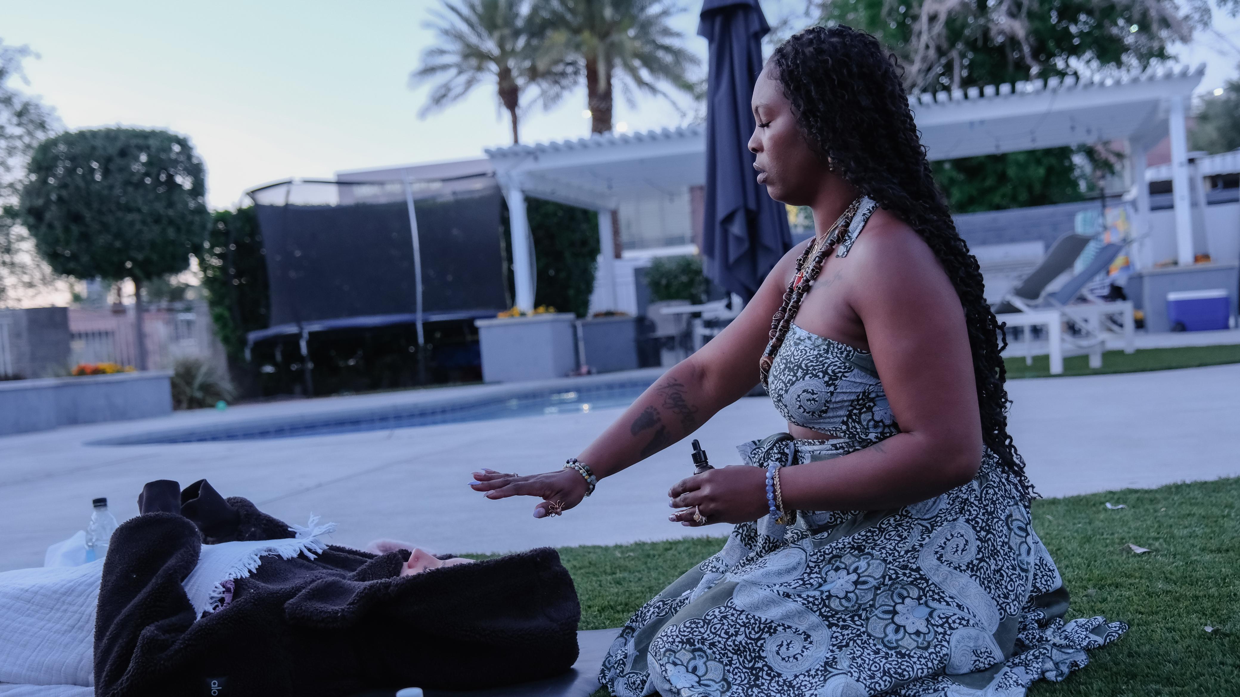 Acacia in meditation during a sacred ceremony