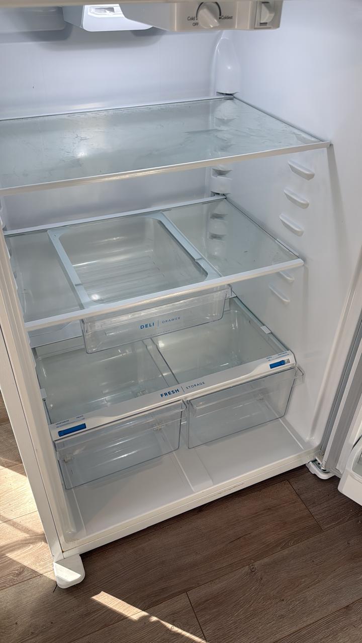 Spotless refrigerator interior after deep cleaning