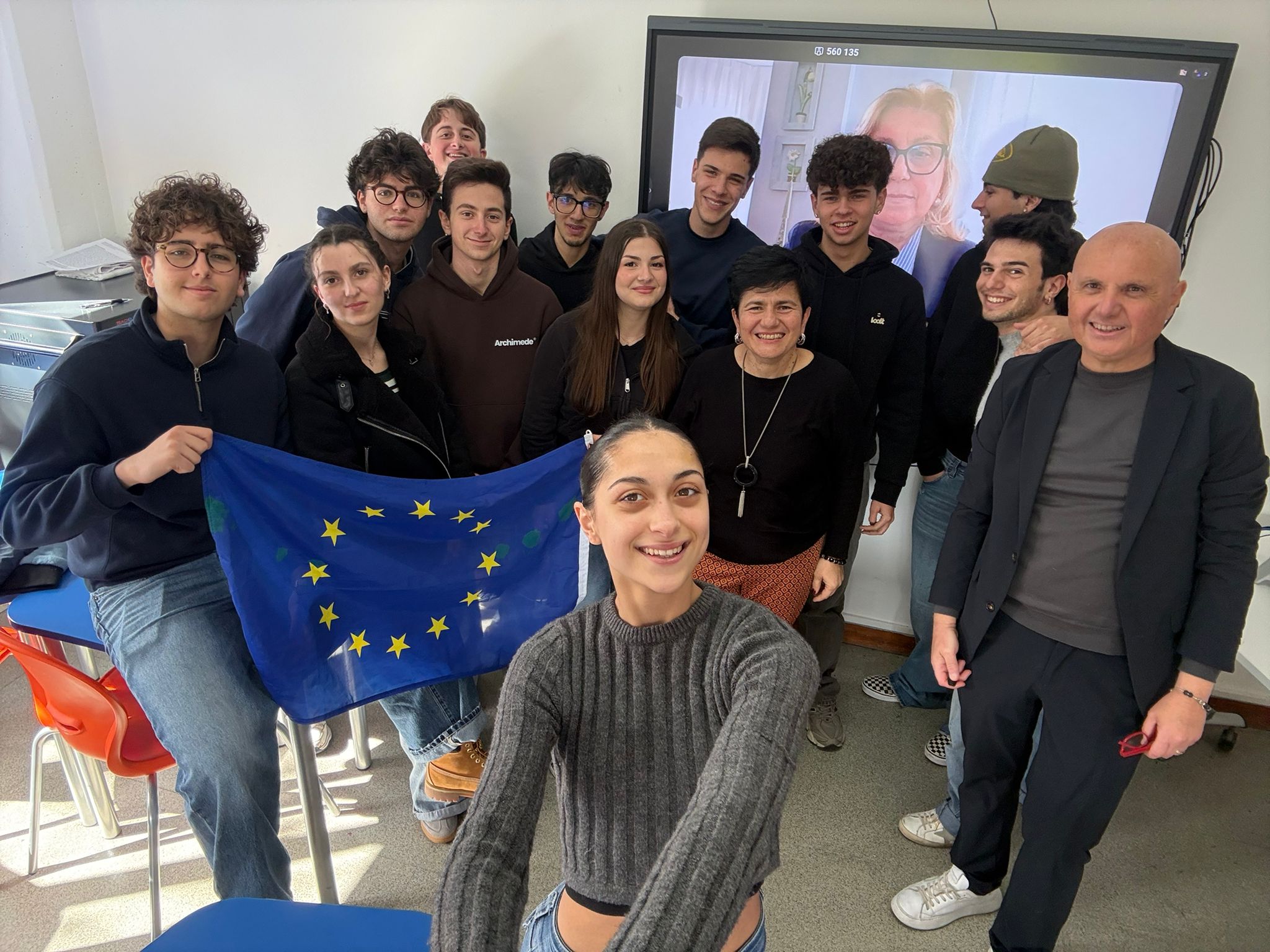 R.A.I.L.S. team selfie with EU flag during video conference session