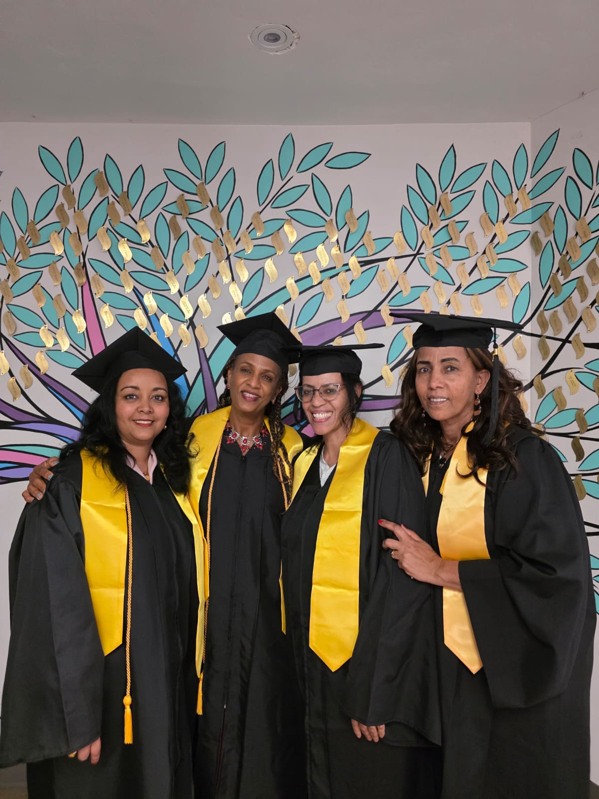 Four Women Graduates - Close Portrait