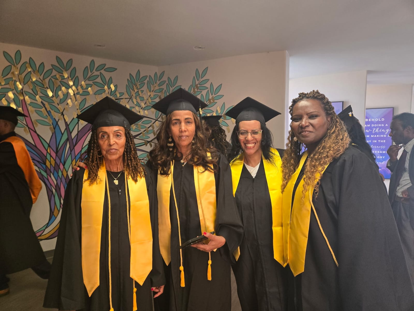 Four Women Graduates - Candid Moment