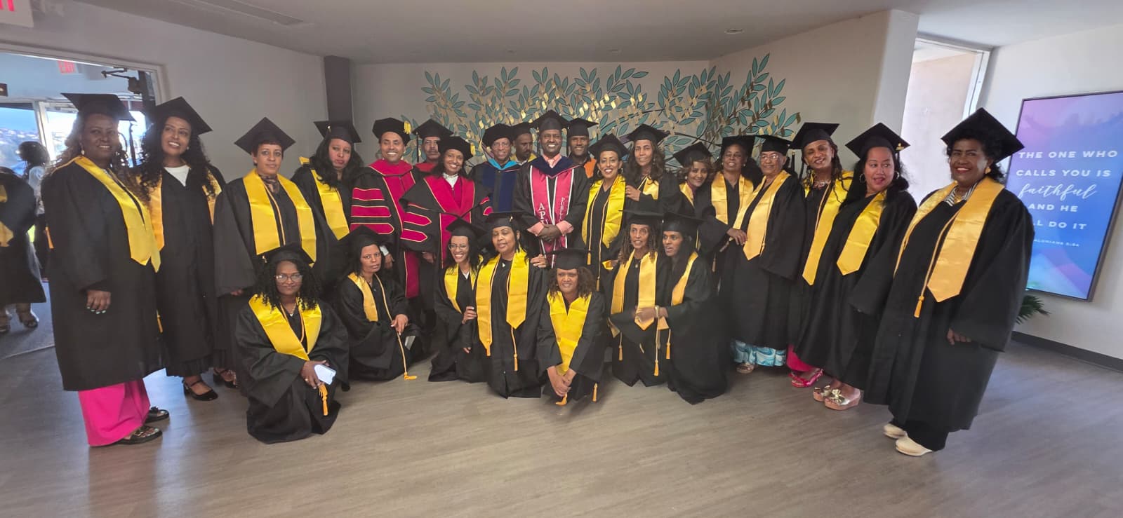 Class Photo with Smiling Graduates