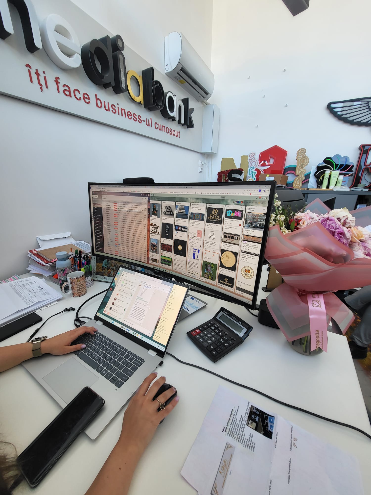 MediaBank office workspace with dual monitors