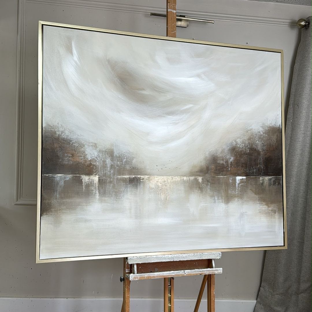 Large white and ivory abstract landscape with swirling sky and reflective water with gold shimmer