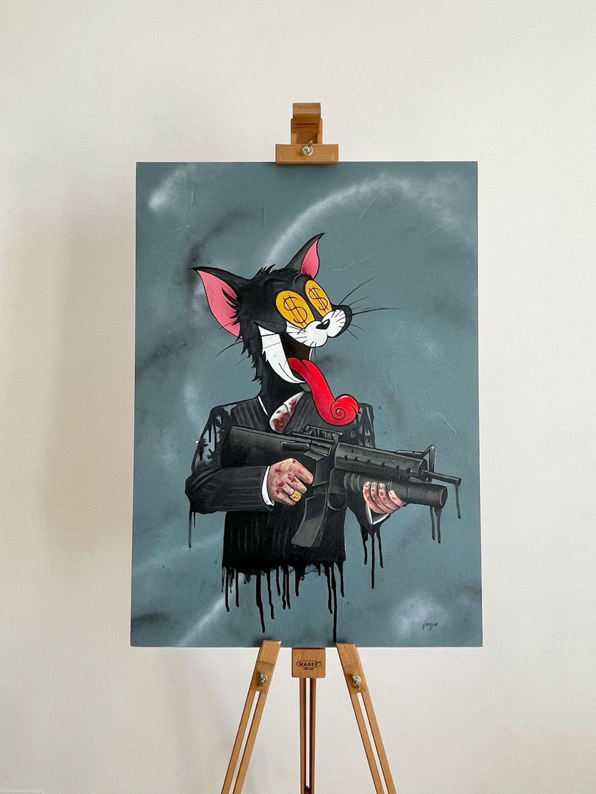 Pop art Tom the cat in a pinstripe suit with dollar-sign eyes and a dripping tongue holding an assault rifle, painted on steel blue canvas on an easel