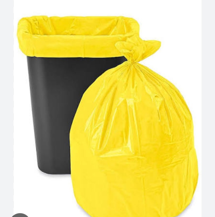 Yellow Bin Liner in Waste Container