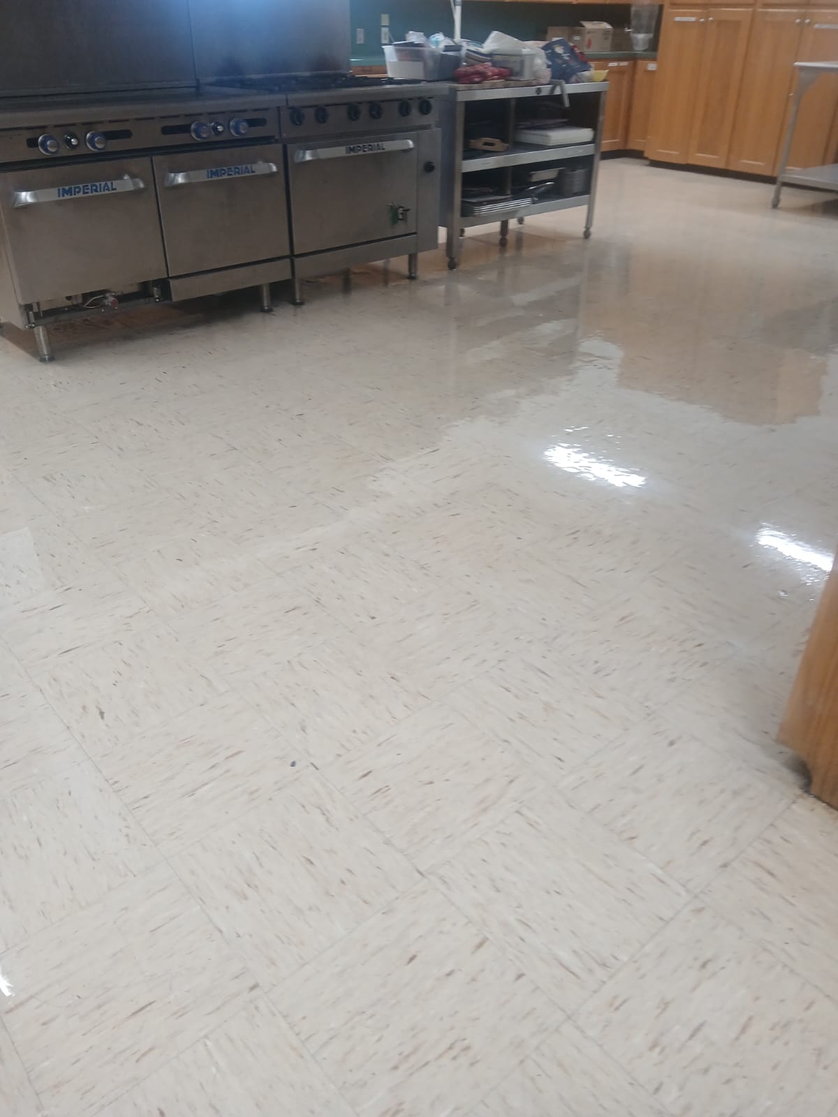 Commercial kitchen VCT floor after cleaning — shiny