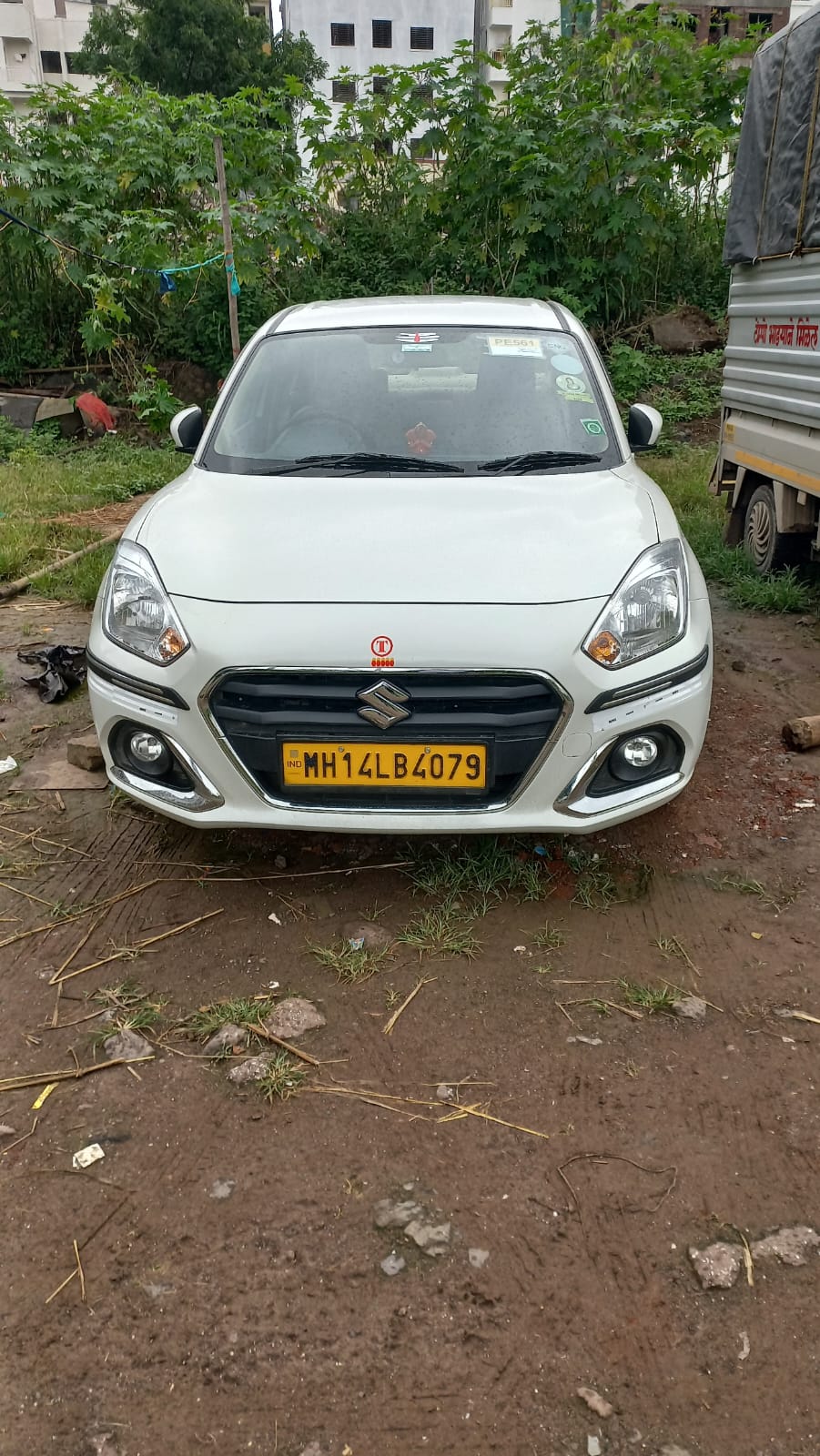 White Dzire sedan front view