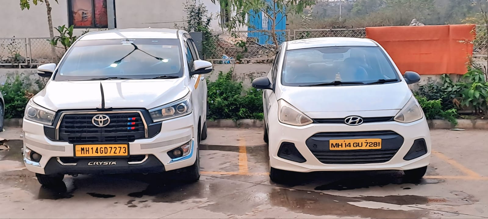 Toyota Crysta and Hyundai i10 vehicles