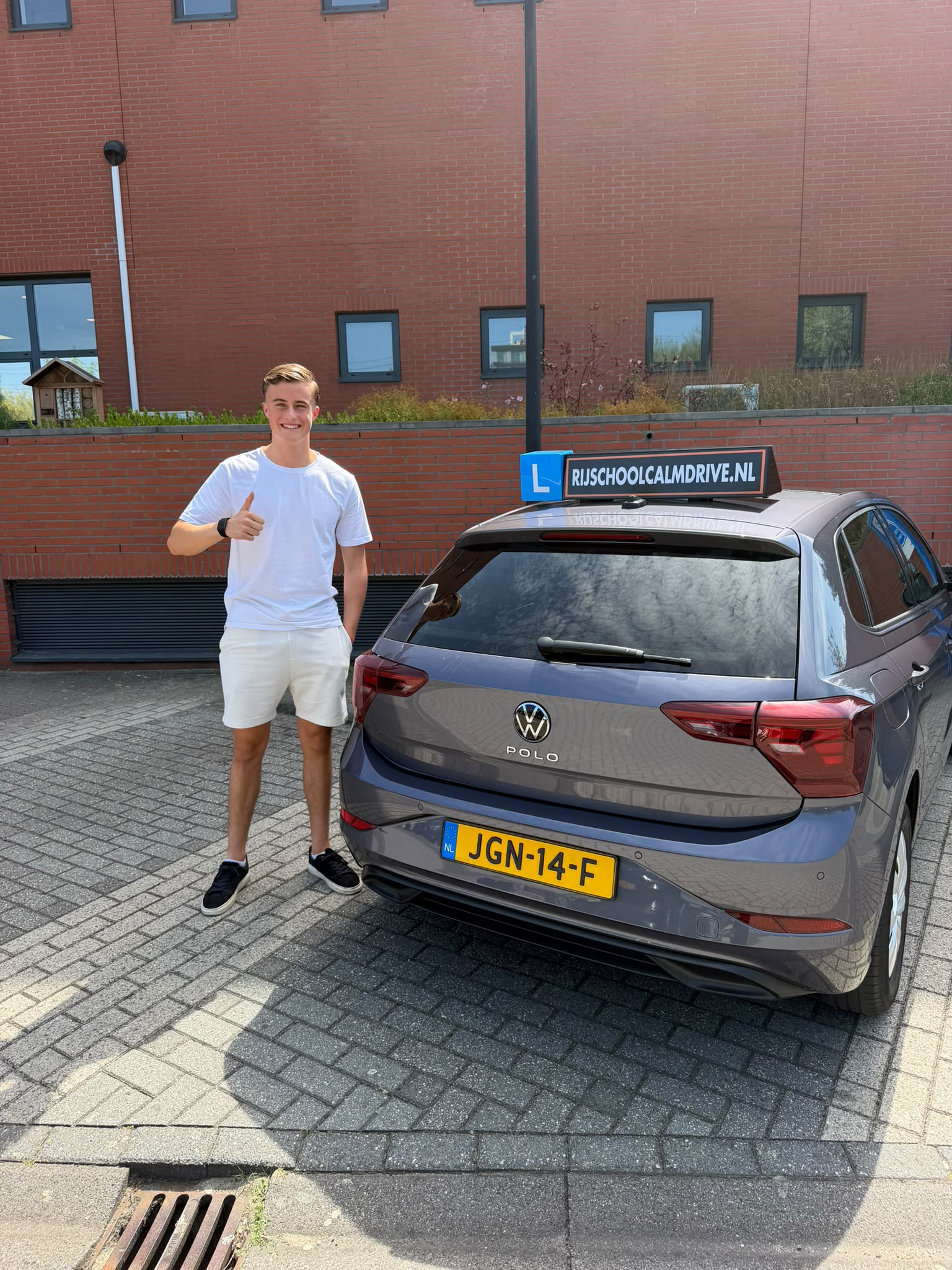 Learner who passed with grey car
