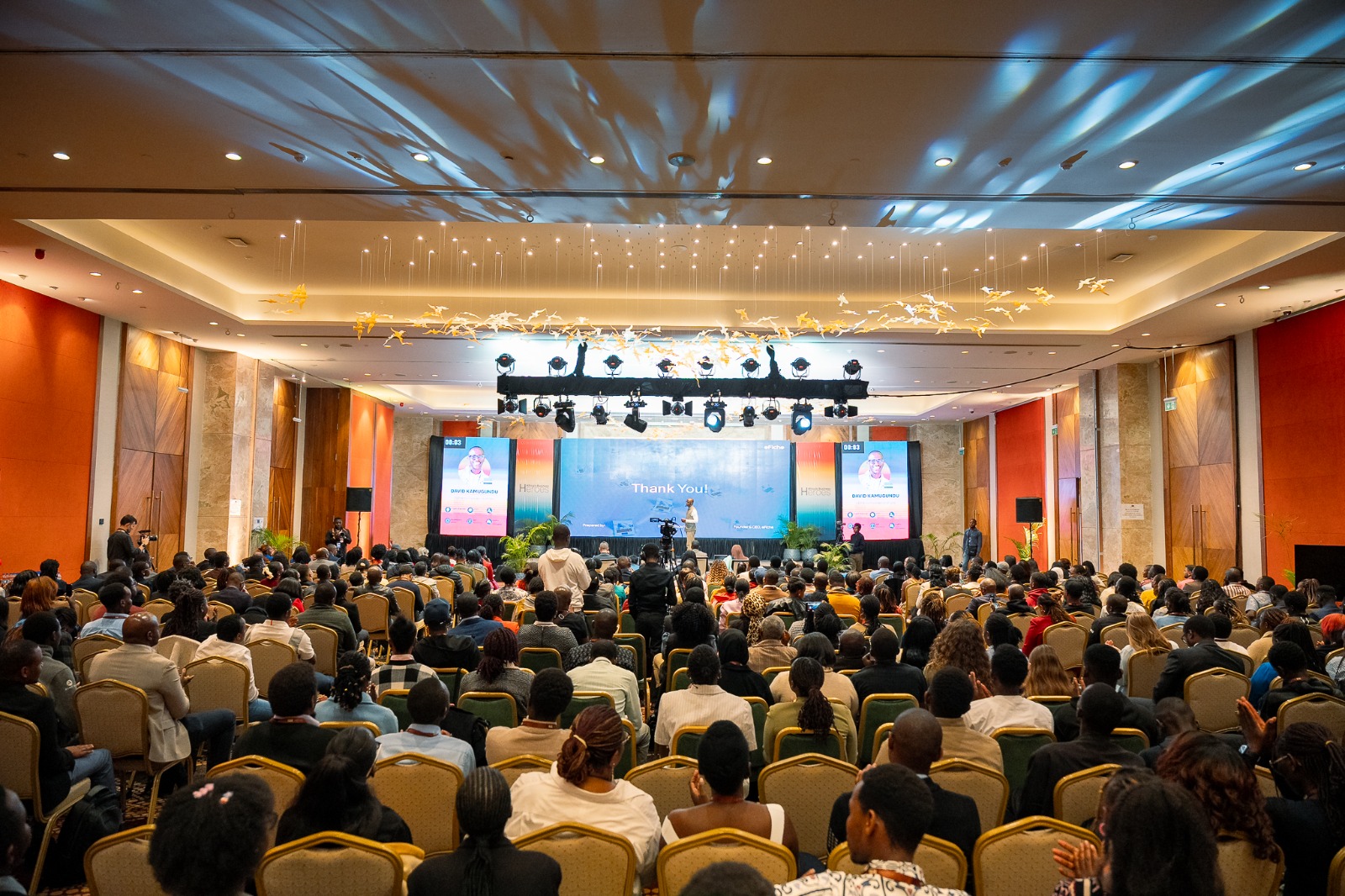 A busy conference and events hall prepared for a large audience