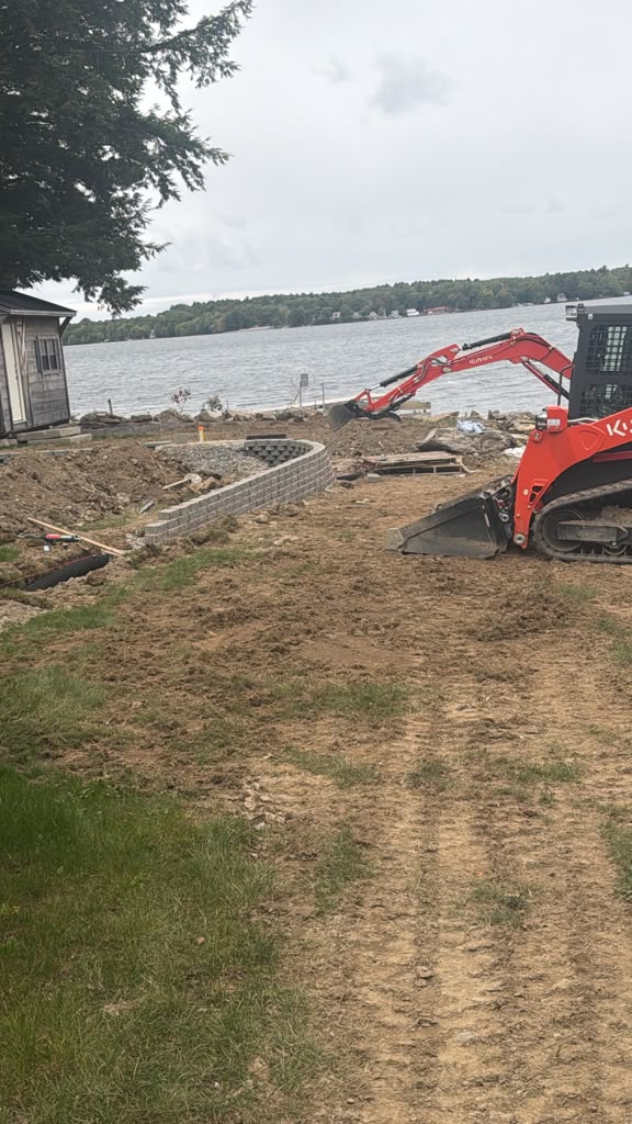Shoreline excavation and retaining wall construction