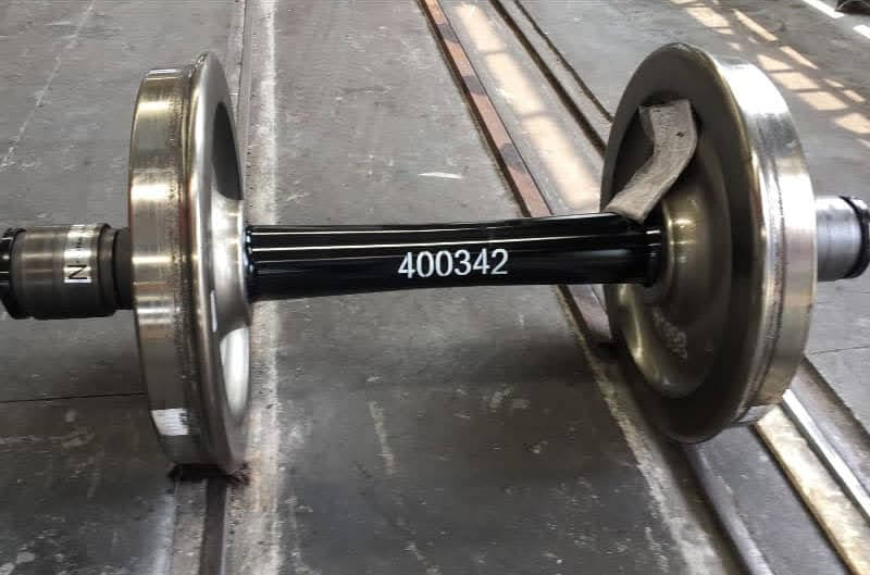 Railway wheel pair with black axle