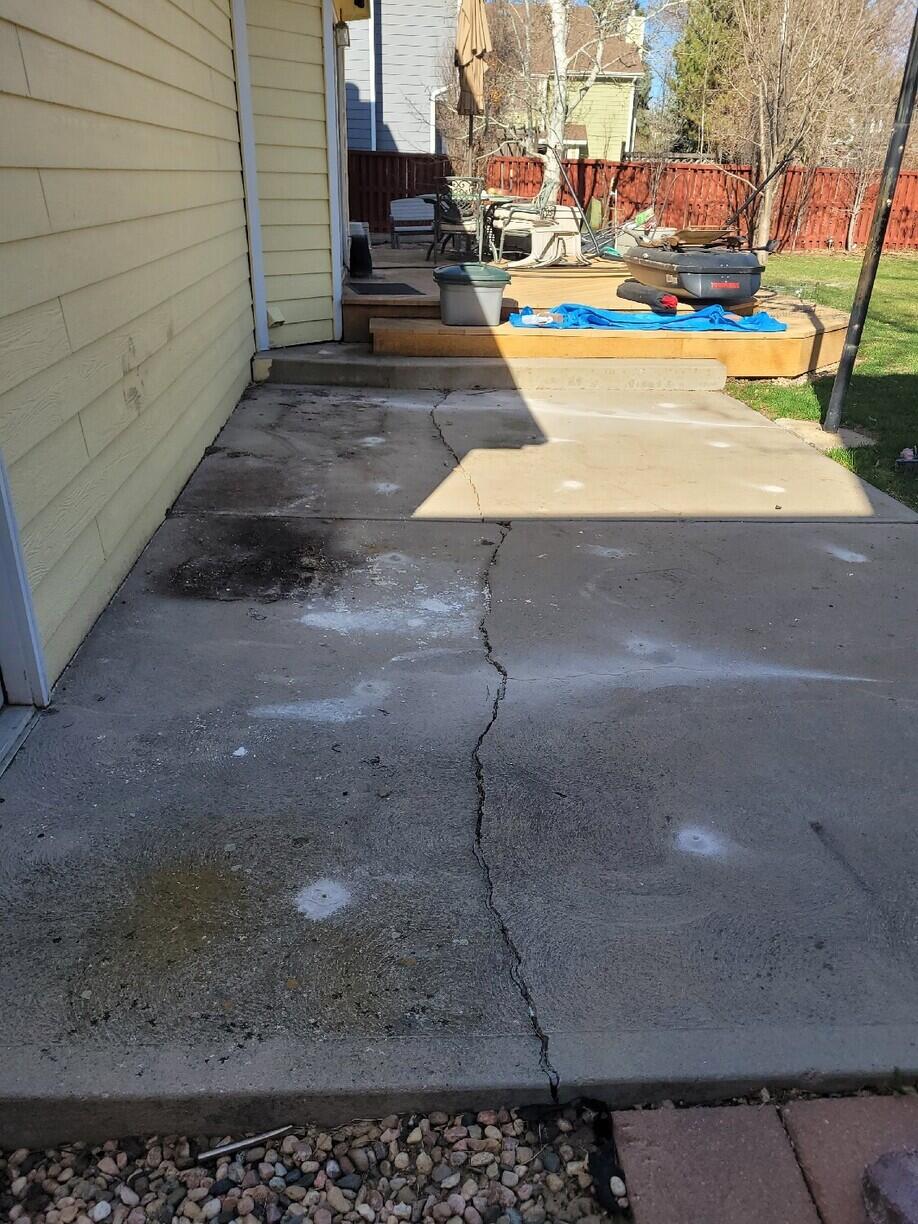 Back Patio Crack Repair - Before