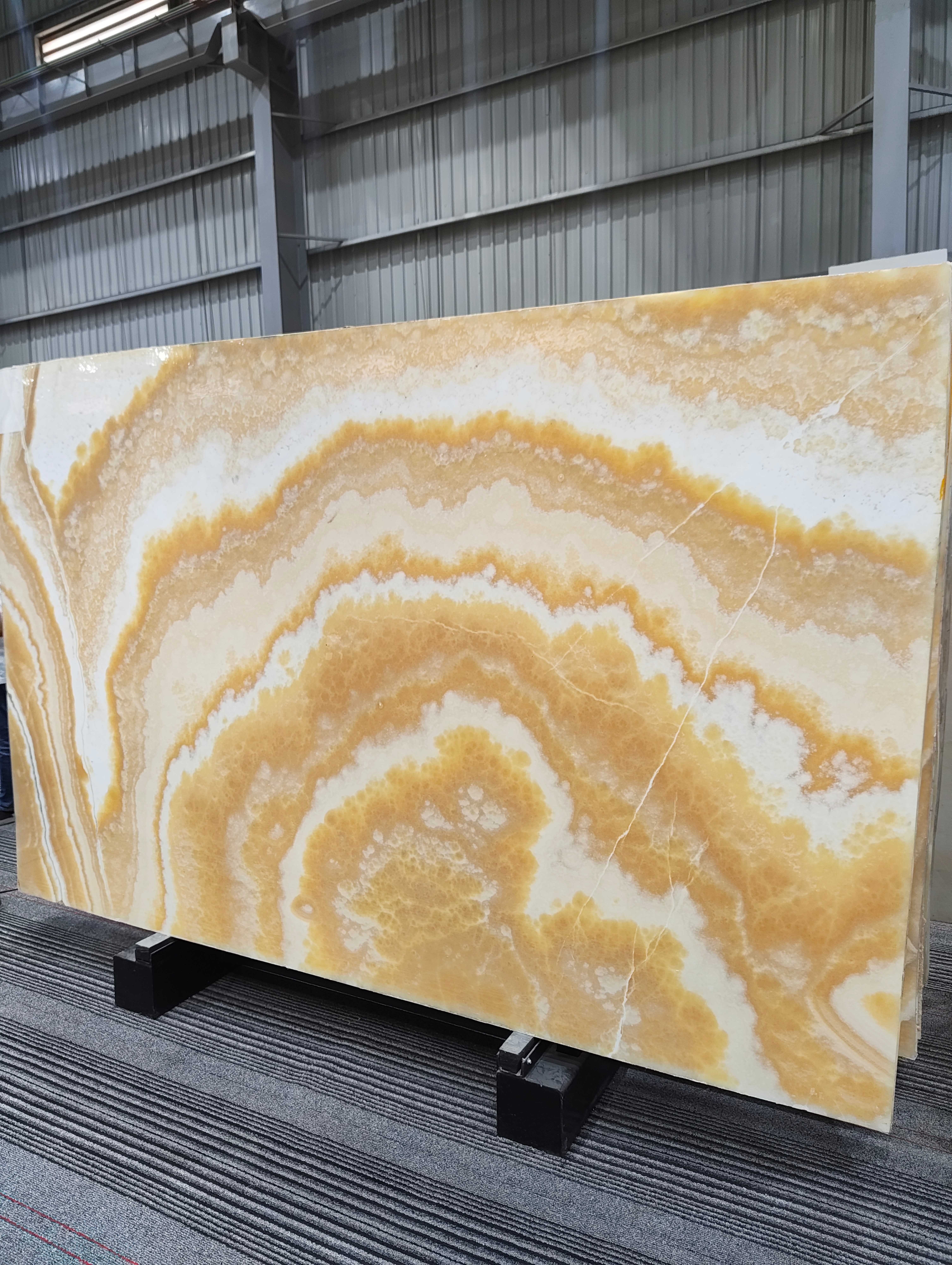 Yellow Sapphire Onyx full warehouse lot view