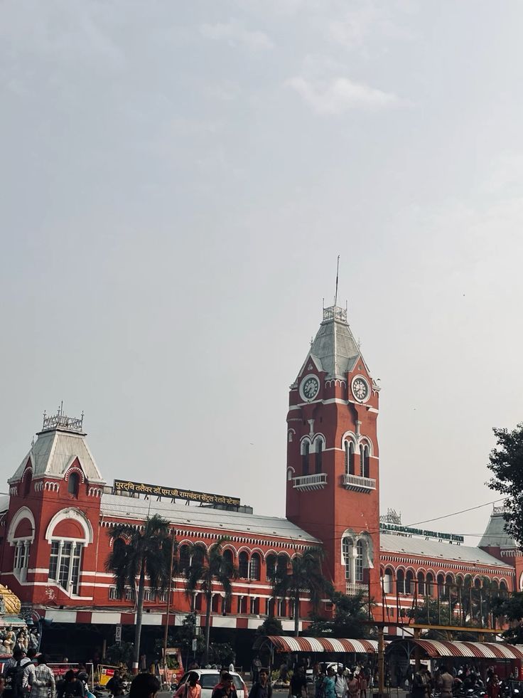 Chennai Central railway station with its red clock tower and busy street