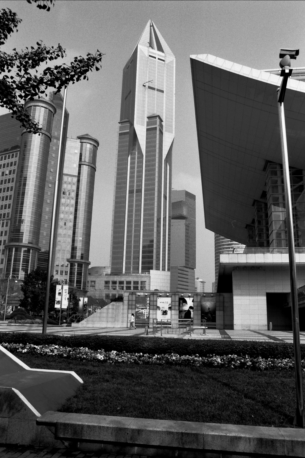 Modern Shanghai skyline with distinctive skyscraper and landscaped gardens