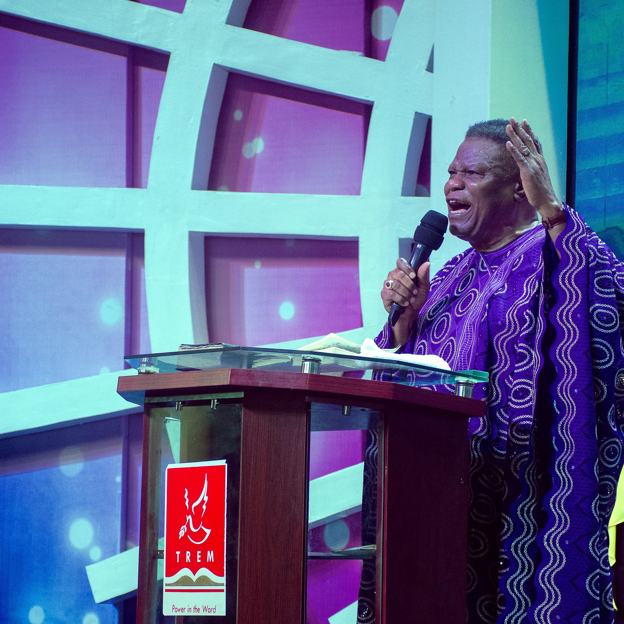 Pastor preaching at TREM pulpit