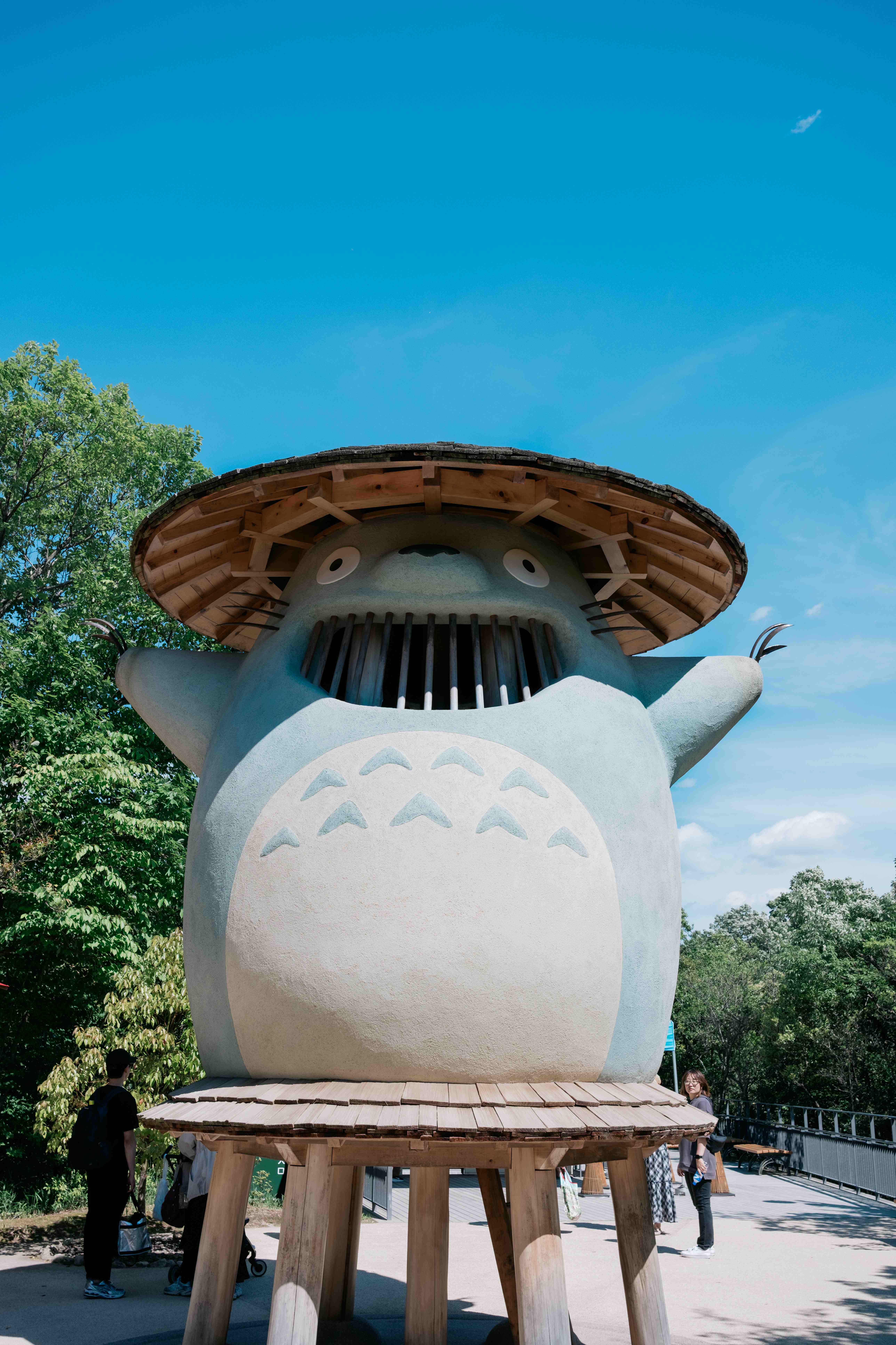 Giant Totoro sculpture against a blue sky