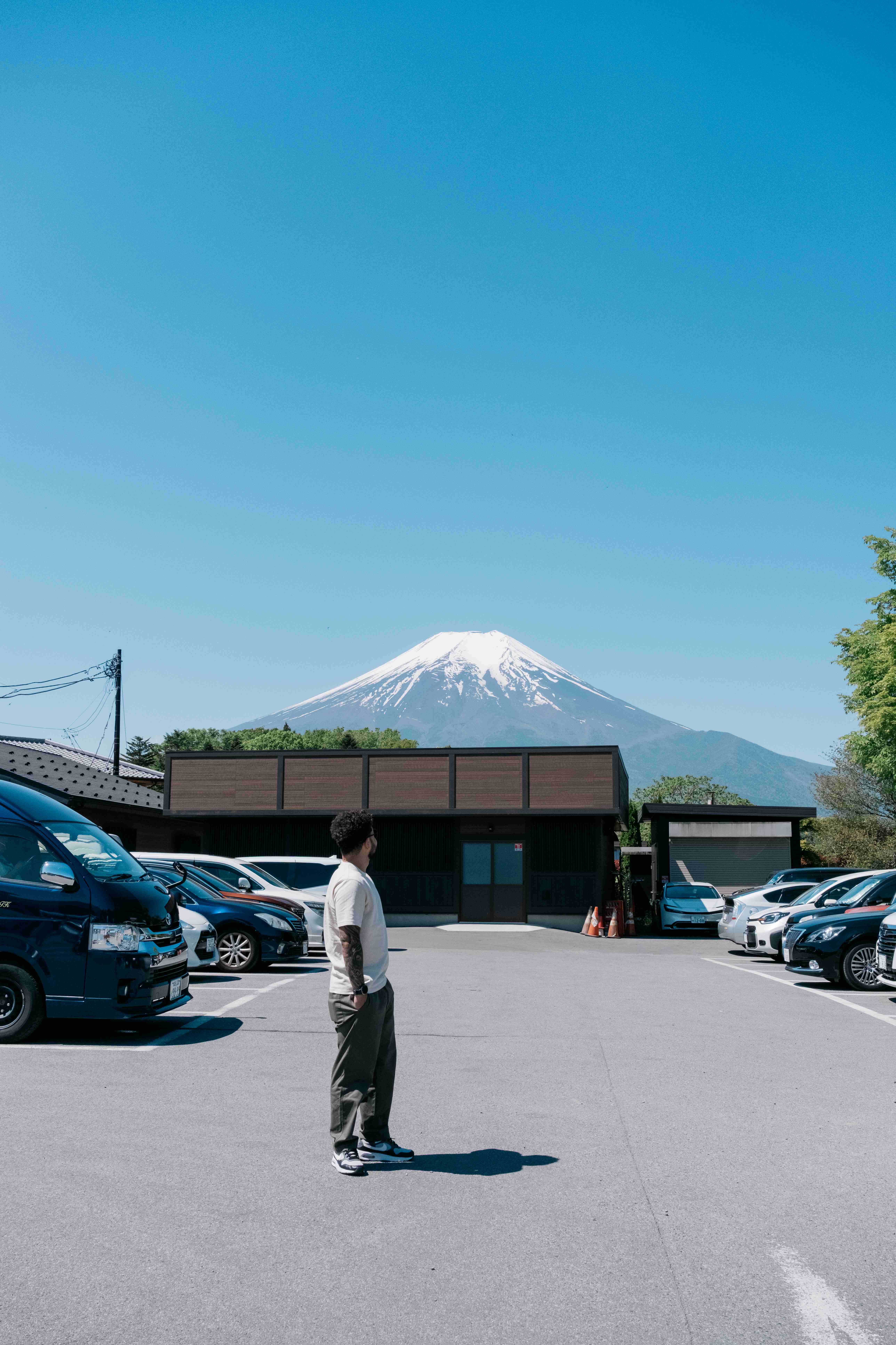 Looking toward Mount Fuji from a parking lot