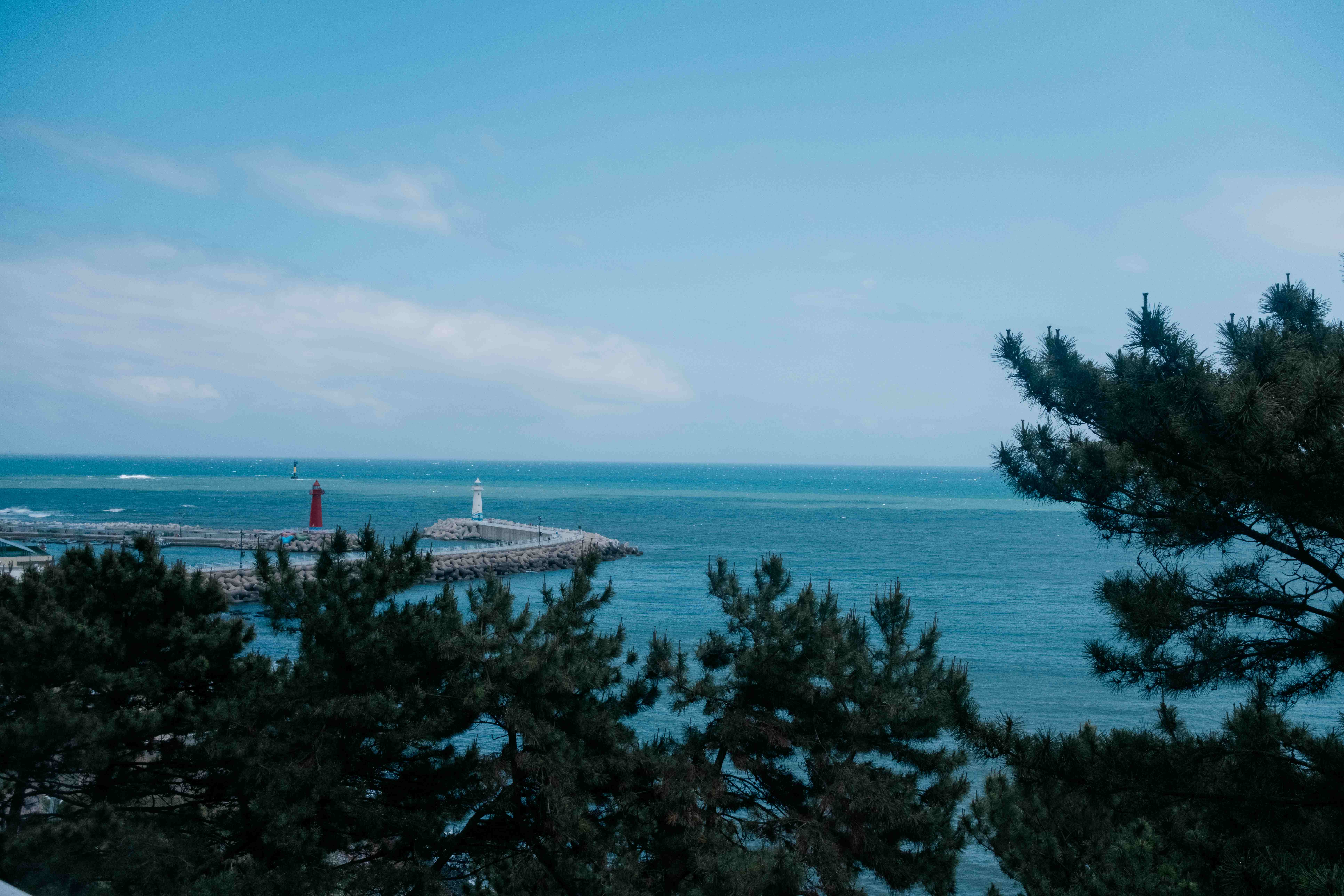 Coastline with red and white lighthouses