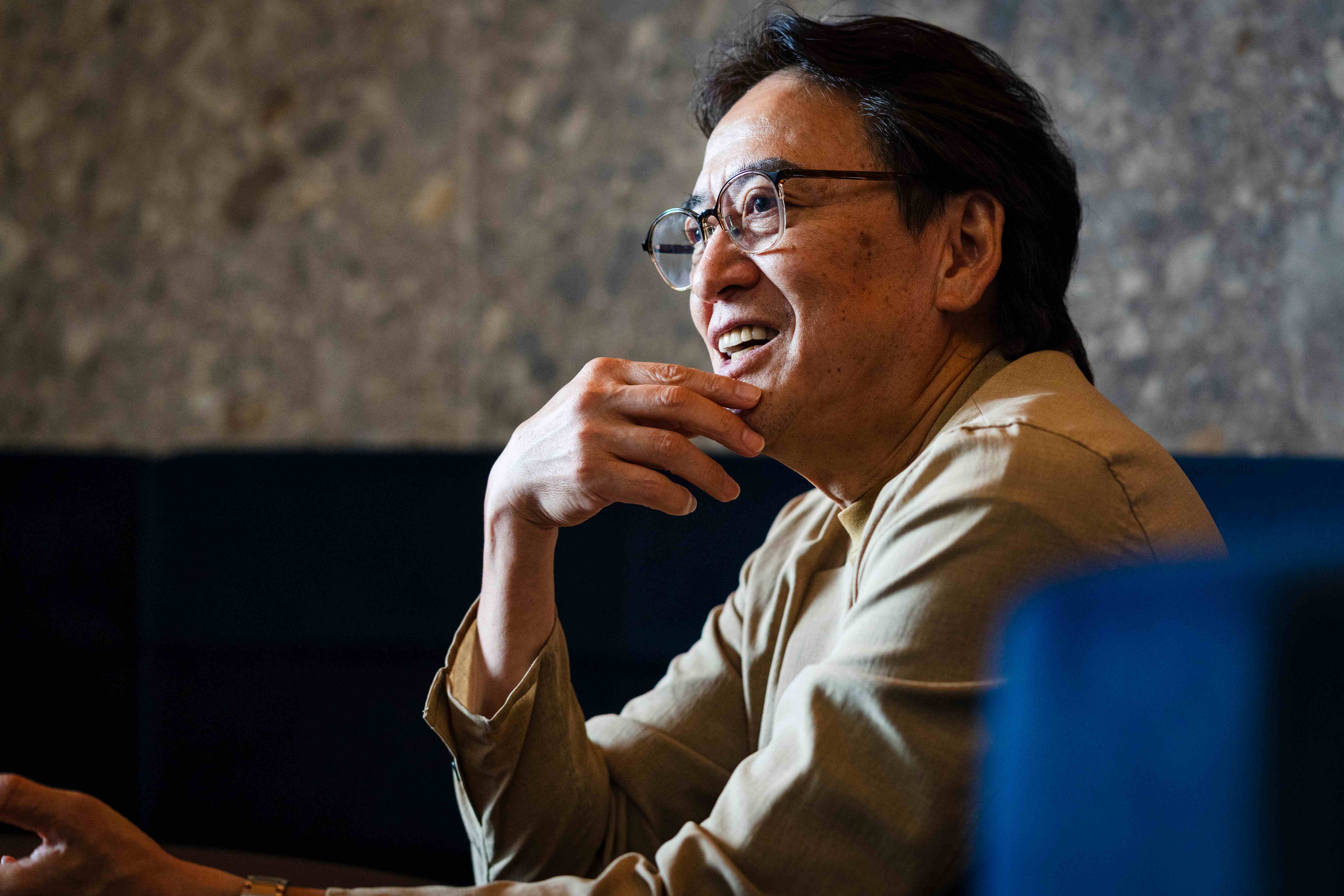 笑顔で熱く語る佐藤吉文さん