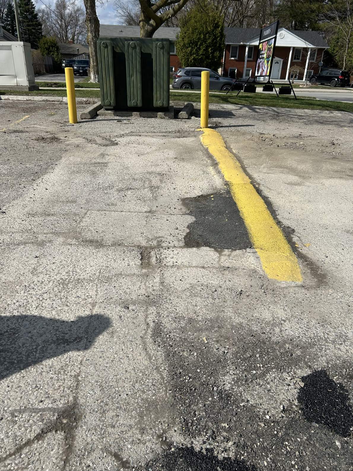 Asphalt & Bollard Installation after