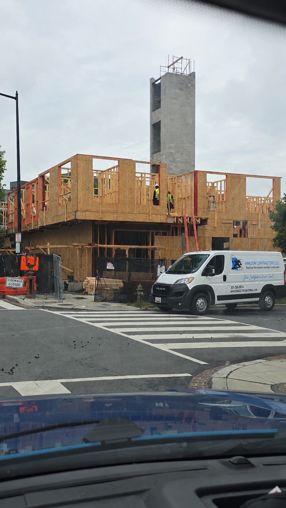 Construction Site with Amazon Contractors LLC Van