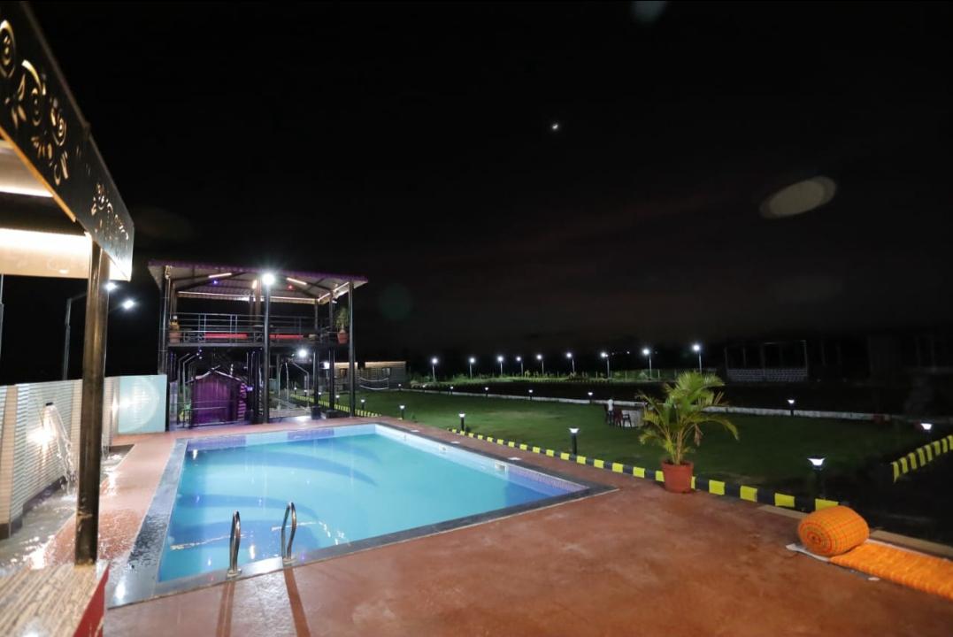 Swimming pool glowing at night
