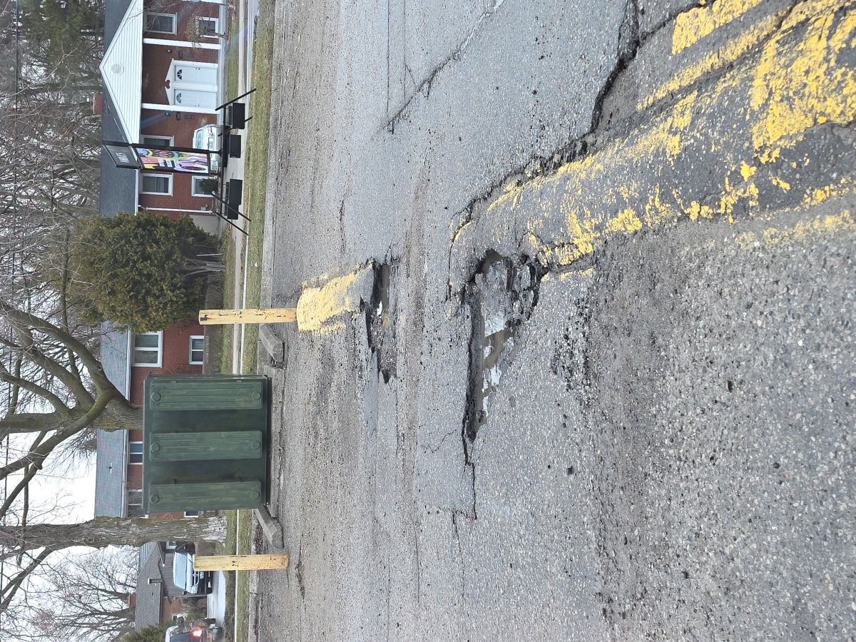 Asphalt & Bollard Installation before