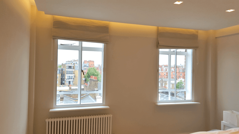 Modern horizontal sliding secondary glazing windows in London South Kensington penthouse with LED cove lighting and rooftop views
