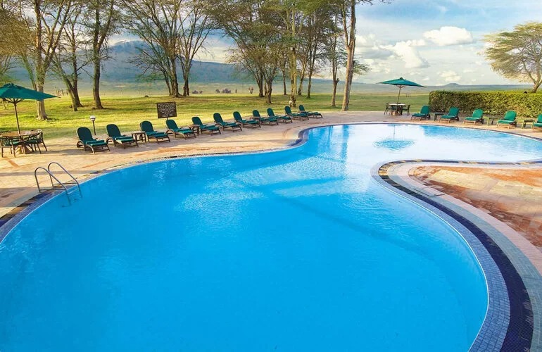 Amboseli lodge swimming pool with Mount Kilimanjaro in the distance
