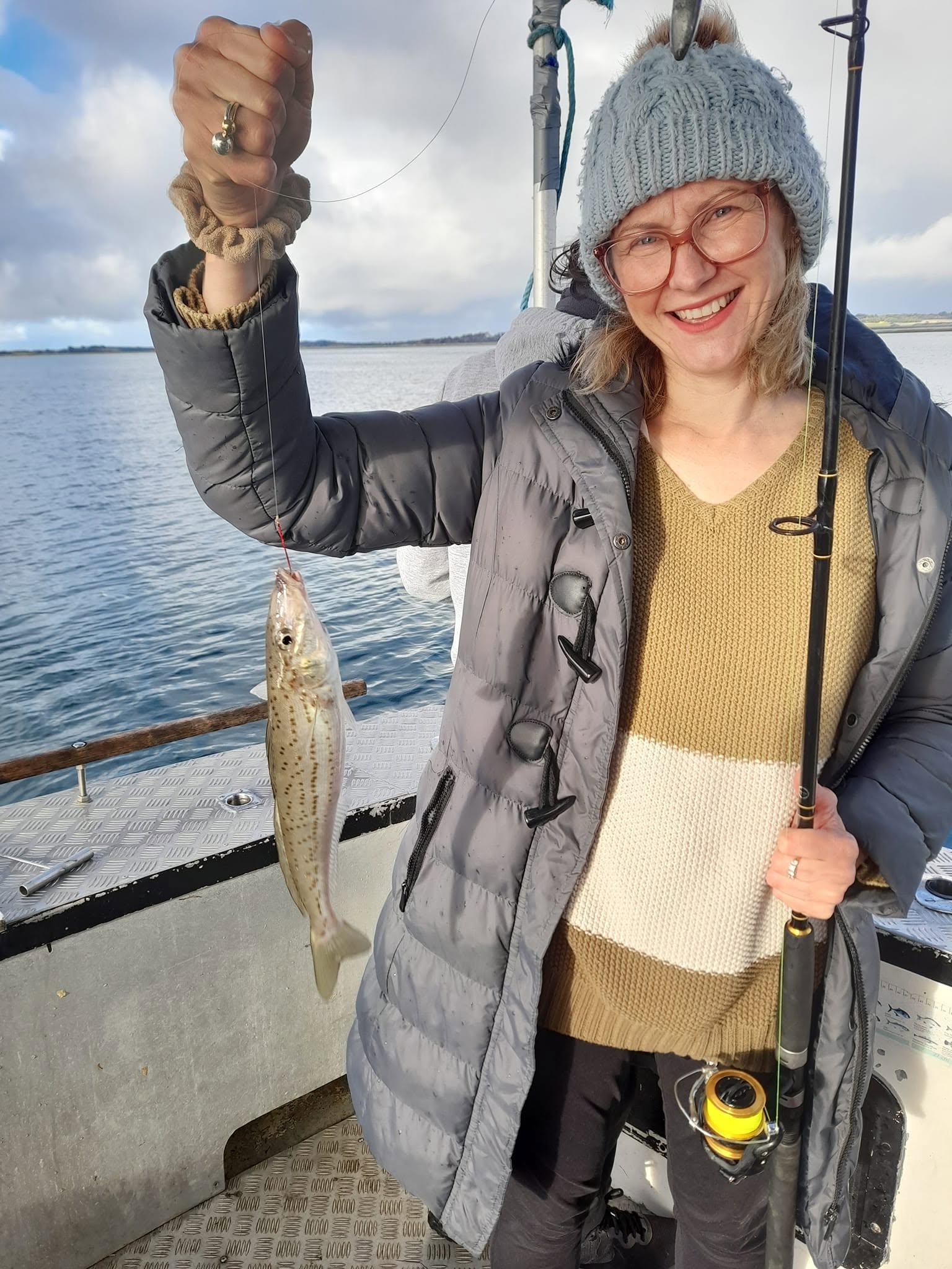 Angler on the charter boat holding a large catch in Western Port Bay