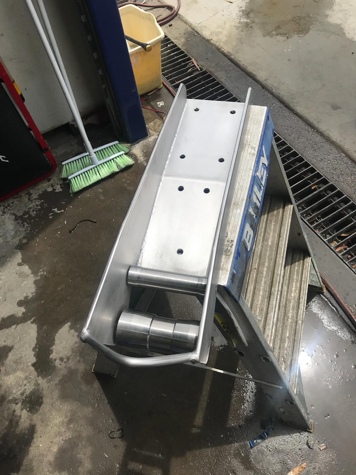 Custom aluminium swim platform and boarding ladder assembly fabricated by LJP Industries