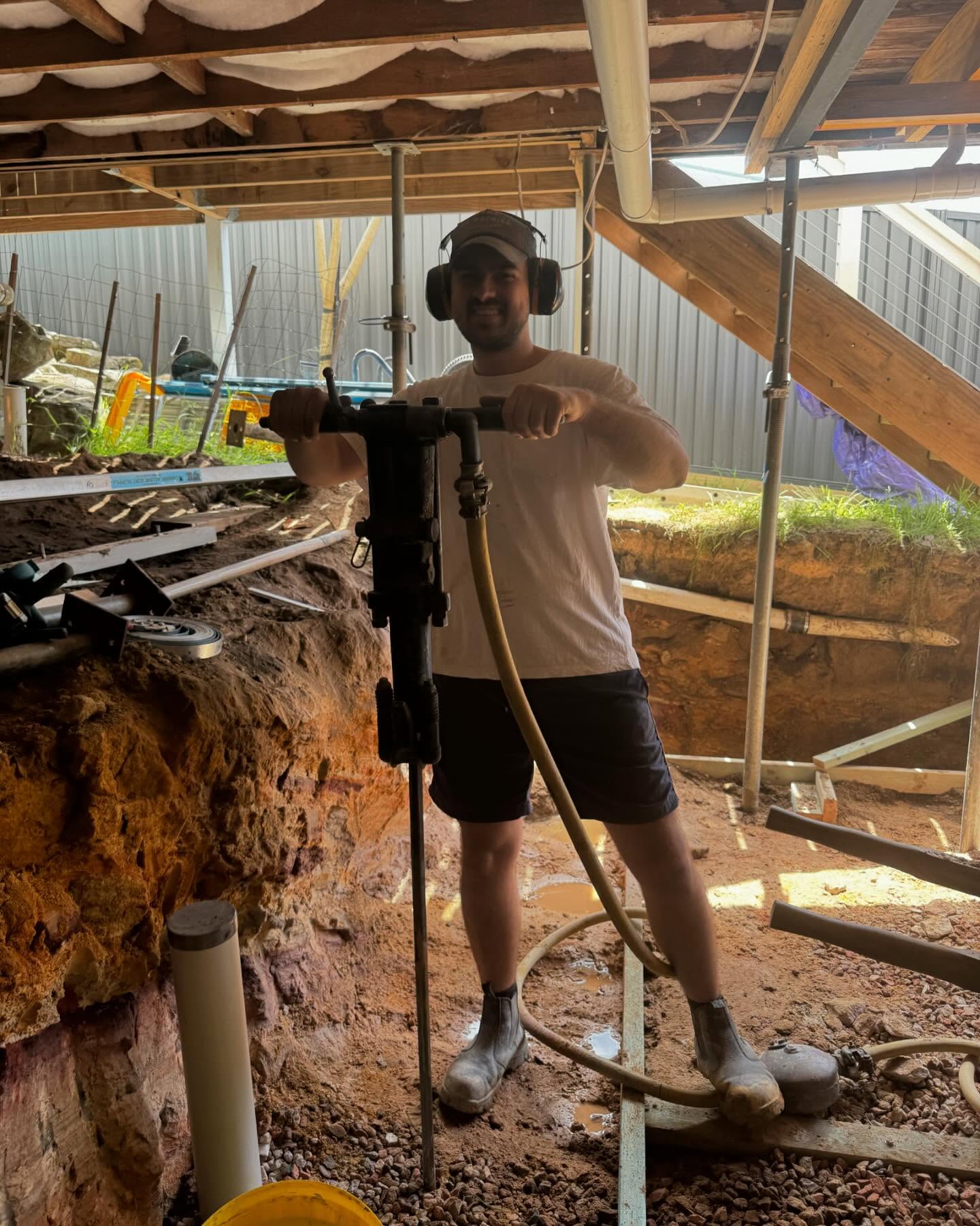 Nelson Constructions team member on a home extension foundation excavation site in Sydney