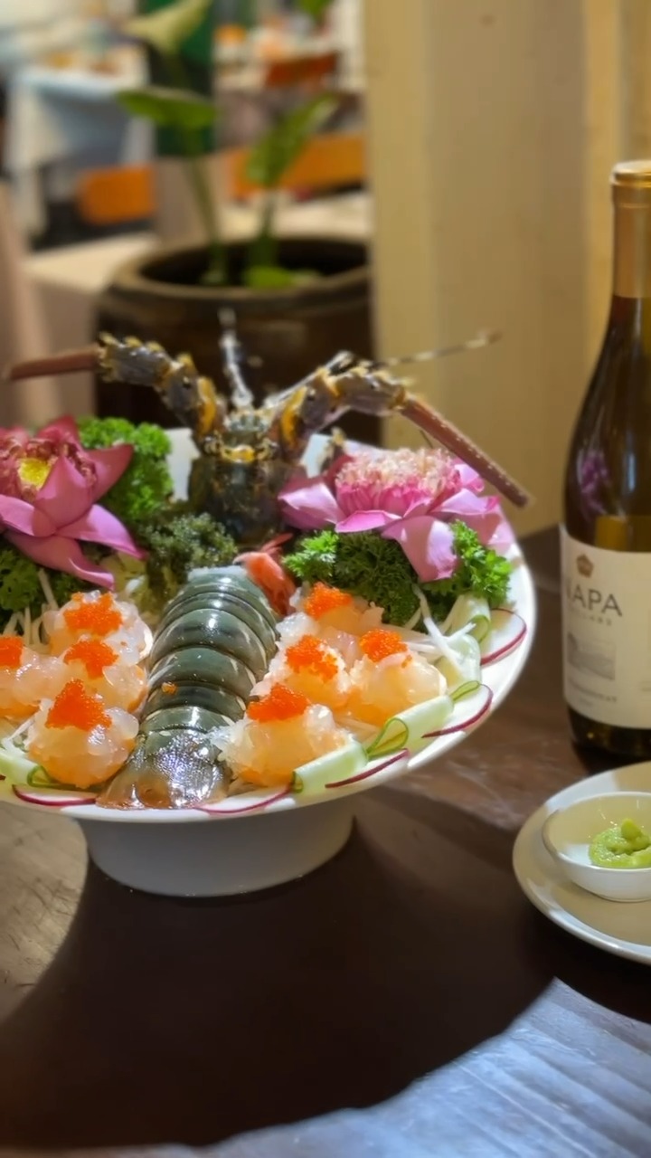 Beautifully presented Vietnamese seafood platter with fresh garnishes