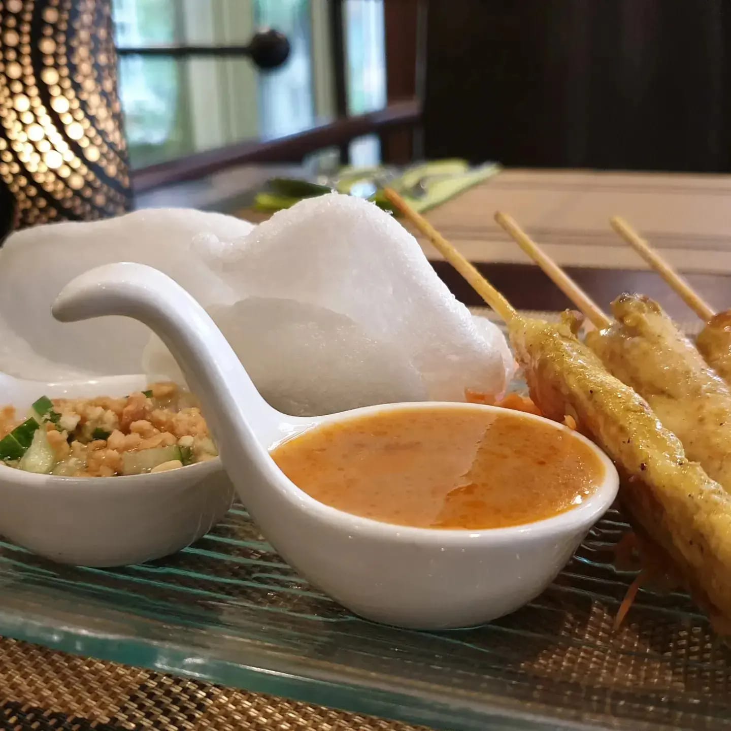 Satay skewers served with peanut sauce, a classic Thai entree