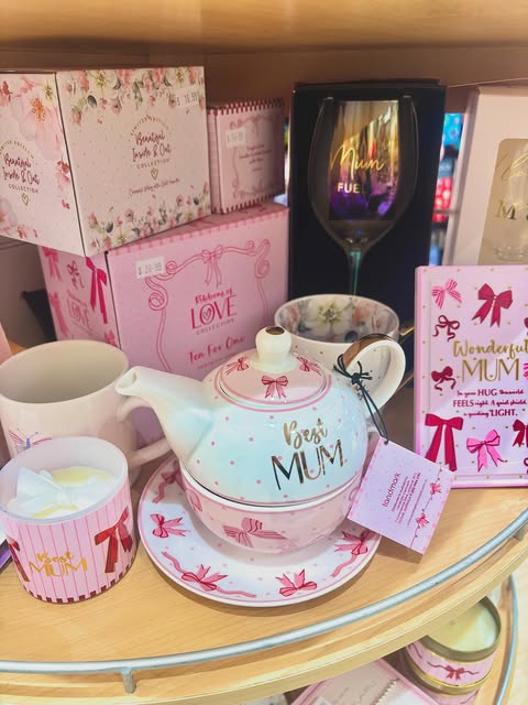 Pink-themed "Best Mum" teapot, wine glass, mugs and gift boxes at The News Agent Cards & Gifts