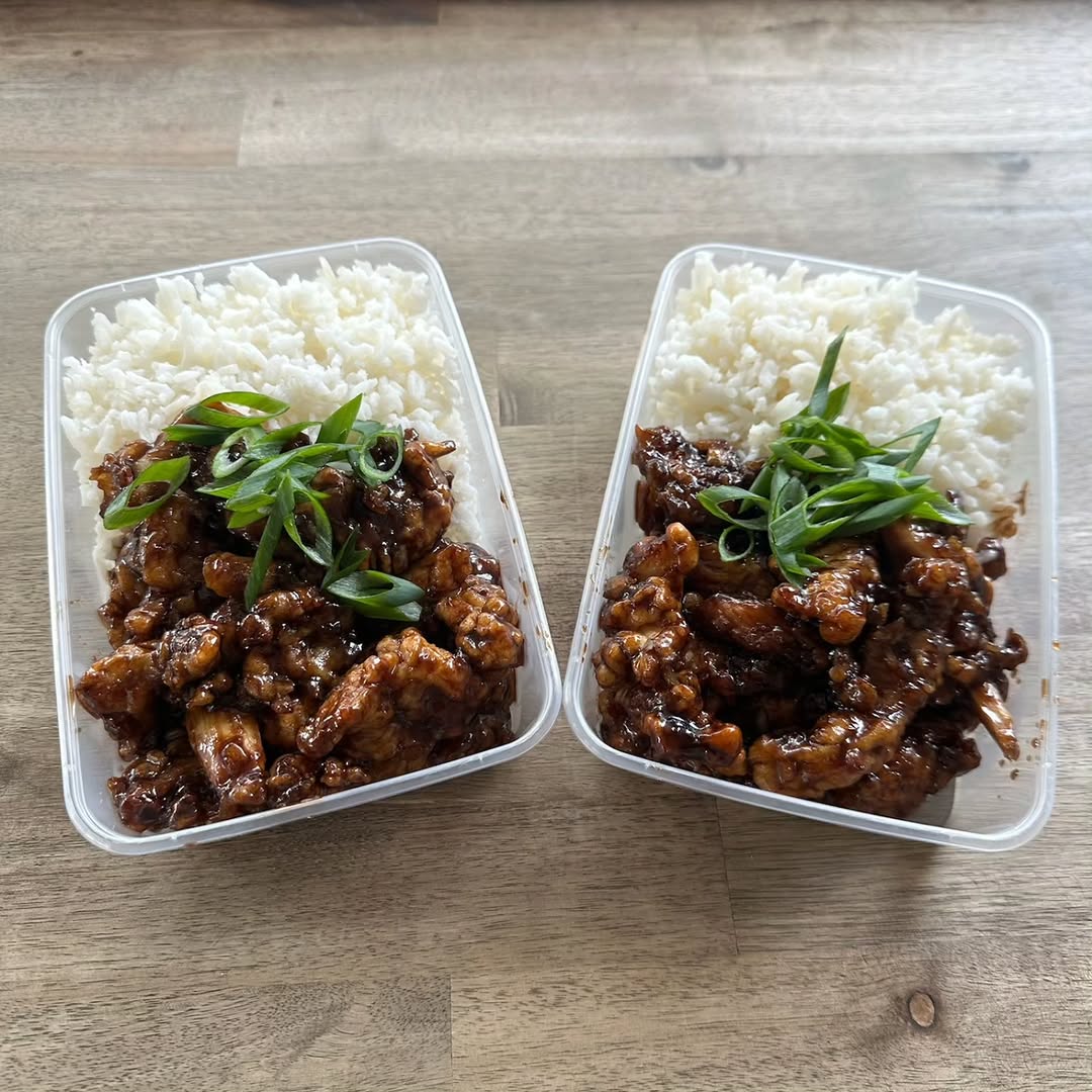 Take-home rice and glazed chicken meal containers ready for pickup