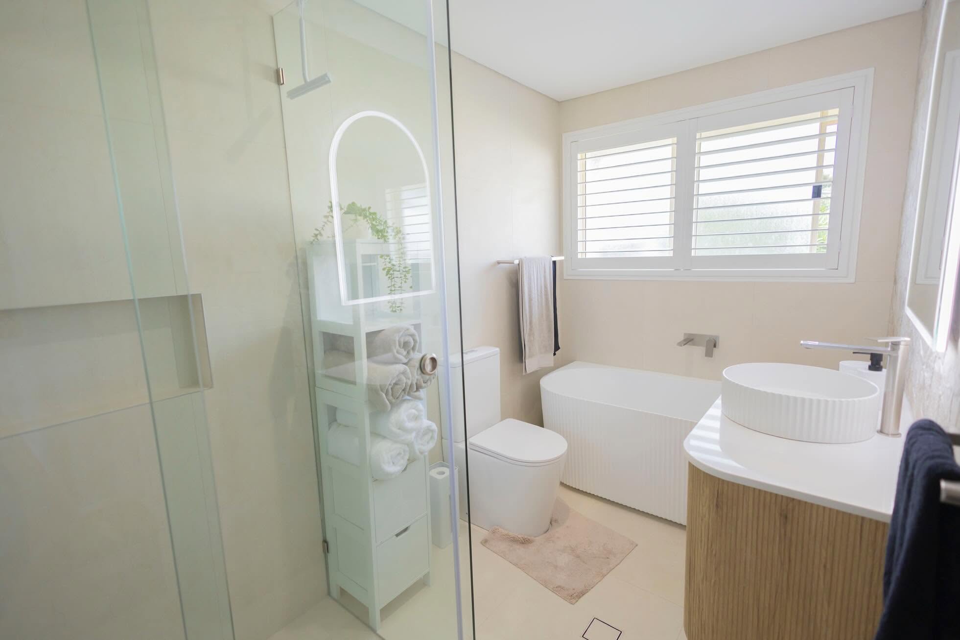 Modern tiled bathroom with glass shower screen, vessel sink and floor tiles – Wollondilly Tiles